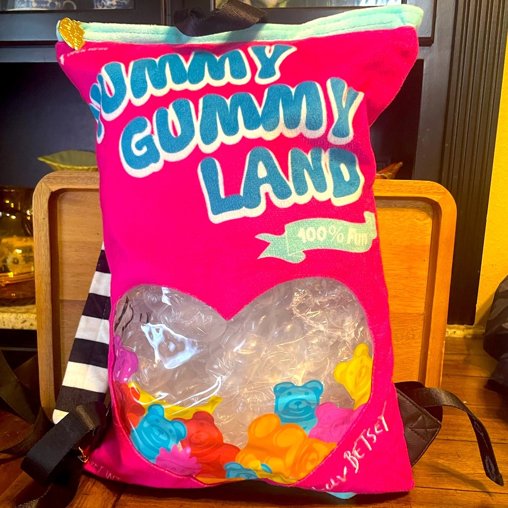 Betsey Johnson Yummy Gummy Land adjustable backpack. Large but lightweight.